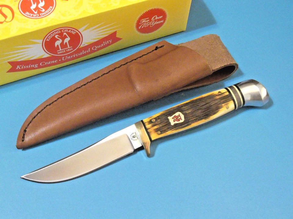 Cuchillo de caza Kissing Crane KC5477 ámbar hueso jigged hoja fija 7 3/4" en general Foto 1 de 4