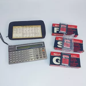 Sharp IQ-3100 Language Translator w/ 4 Language Modules Working Vintage - Picture 1 of 11