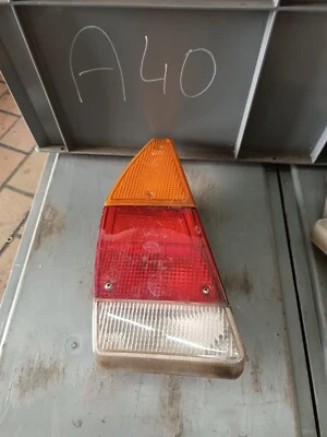 Originale VW Passat Variant B1 Tipo 33 Fanale SX Completo Hella VW 331945215 - Immagine 1 di 4