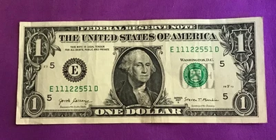 2017A DOLLAR BILL WITH A TRIPLE AND TWO PAIRS TOGETHER - Image 1 of 2