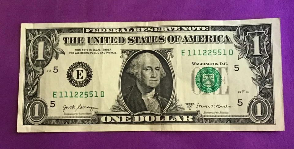 2017A DOLLAR BILL WITH A TRIPLE AND TWO PAIRS TOGETHER - Image 1 of 2