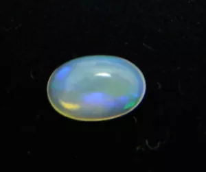 .615 Carats Natural Multi-color Ethiopian Opal Cabochon Gemstone Oval EOPL75 - Picture 1 of 2