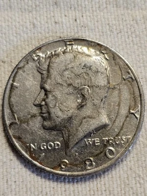 Obverse Die Break/Annealing Error Filled Mint Mark 1980 P Kennedy Half Dollar  - Image 1 of 2