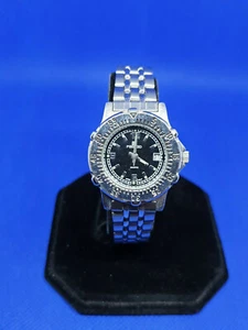 ladies poschauko chrome bracelet watch,black dial with date display window.#49. - Picture 1 of 8