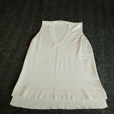 Top Cyrus Mujer Pequeño Blanco Tejido Causal Sin Mangas Causal Acogedor Salón Día Foto 1 de 4