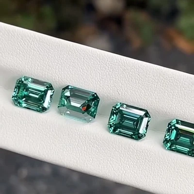 Aqua Blue Color VVS1 Emerald Cut Moissanite Stone Loose Gemstone with GRA Cert - Image 1 of 4