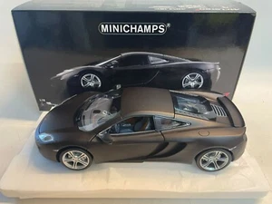 MINICHAMPS Mclaren MP12-C Matt Black 2011 1/18 110133021 - Imagen 1 de 2
