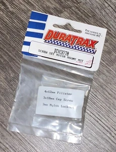 JUEGO DE TORNILLOS DURATRAX DTXC8770 MONTAJE MOTOR MST PIEZA RARA DE RADIOCONTROL - Imagen 1 de 1