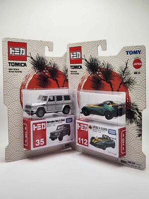 TOMY TOMICA #112 Lotus 3-Eleven & #35 Mercedes-Benz G-Class - Image 1 of 3