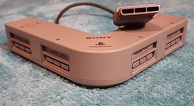 Genuine OEM Sony Multitap for PlayStation 1 SCPH-1070 - 4 Players PS1 PSX Tested - Immagine 1 di 4