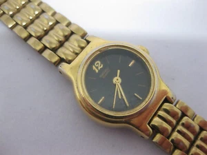 Seiko V401-0988 Gold Tone Quartz Analog Ladies Watch Black Face FRESH BATTERY - Picture 1 of 4