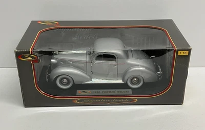 1/18 Signature Models - 1936 PONTIAC DELUXE (SILVER) die-cast #18106 - Image 1 of 4