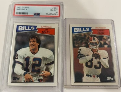 1987 Jim Kelly Topps Base Rookie RC PSA 8 HOF Bills + 1987 Andre Reed - Image 1 of 4