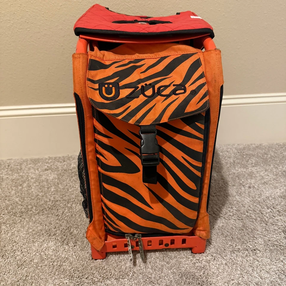 Marco de bolsa de coche deportivo Zuca naranja a rayas de tigre Foto 1 de 4