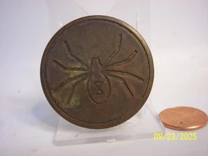 IT IS A SPIDER WITH NO OTHER MARKINGS CHALLENGE COIN - Picture 1 of 2