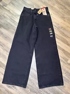 Pantalones de mezclilla holgados de tiro medio de pierna ancha negros lavados descoloridos 25 x 31 para mujer Levi's '94 - Imagen 1 de 10