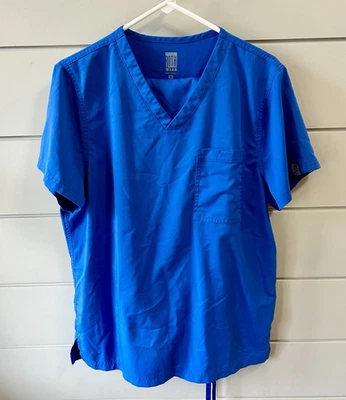 Conjunto Exfoliante Azul Para Hombre de Roth Wear: Cuello en V Mediano y Pantalones a Juego Foto 1 de 4