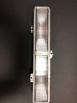 Oldsmobile 98 1977 NOS LH estacionamiento carcasa ligera Foto 1 de 4