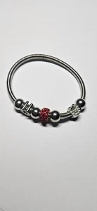 Charm bracelet - charms x7 - Elasticated metal bracelet - Picture 1 of 3
