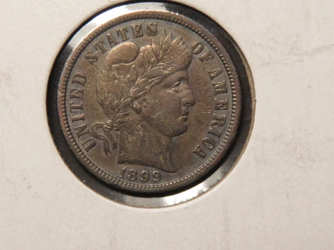1899-O Barber Dime, XF, old, very light obverse cleaning, nicely retoned Cover