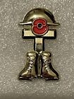 helmet and boots remembrance pin badge 