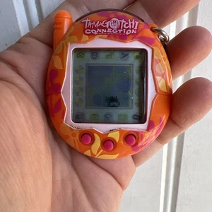 2004 Tamagotchi Connection V3 Rare Vintage Orange Flowers TESTED Works - Bild 1 von 4