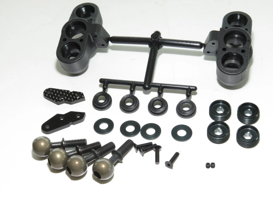 MUGE2027 MUGEN SEIKI MBX8R NITRO BUGGY FRONT UPRIGHT STEERING KNUCKLES - Image 1 of 1