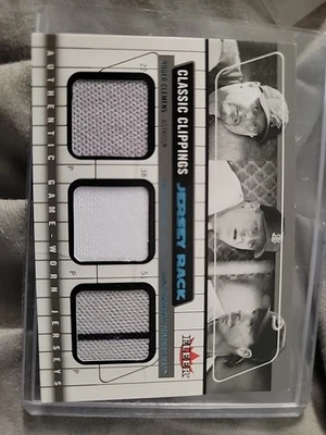 2005 Fleer Classic Clippings CLEMENS / JOHNSON / SCHMIDT Game-Worn Jersey Rack - Image 1 of 2