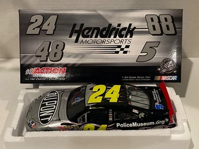 JEFF GORDON #24 2010 DUPONT NATIONAL LAW ENFORCEMENT   1/24 - Image 1 of 4