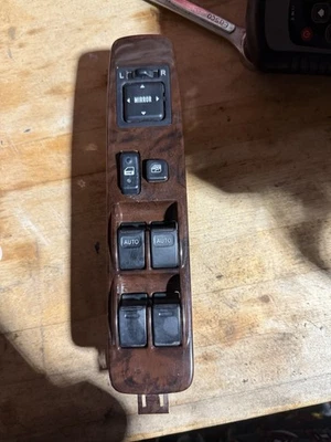 Interruptor maestro de ventana eléctrica Toyota 4runner 1996-2002 bisel de madera OEM Foto 1 de 4