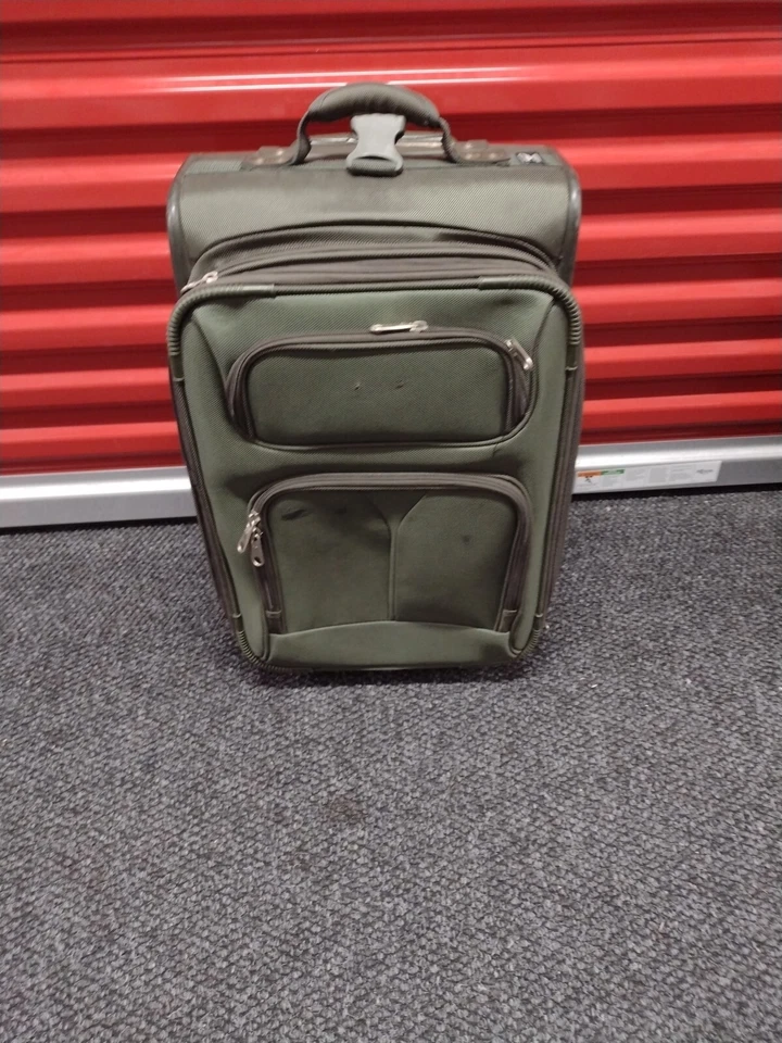 DELSEY 23” Softside Expandable 2-Wheel Rolling, Carry-On Luggage, Green - Image 1 of 4
