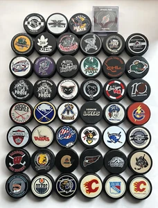 HOCKEY PUCK LOT of 46 PUCKS NICE COLLECTION NHL AHL IHL QMJHL CHL UHL NCAA WPHL - Picture 1 of 11