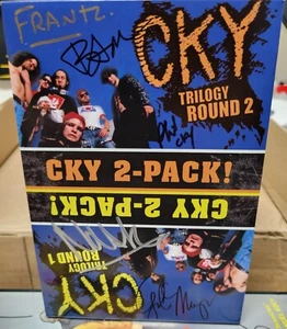 CKY 2 Pack DVD Box Set SIGNED By BAM MARGERA April Phil Trilogy Round 1 & 2 NEW! - Picture 1 of 6