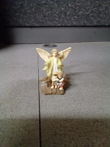 Resin Mini Schutzengel über/Schutz Junge & Mädchen - Bild 1 von 3