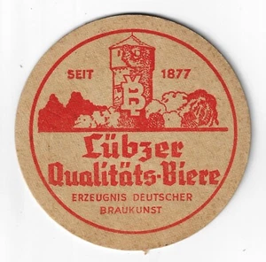 Bierdeckel Lübzer Qualitätsbiere Erzeugnis Deutscher Braukunst Amtsturm um 1965 - Bild 1 von 2