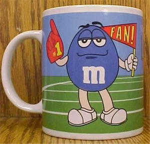 M&M Süßigkeitenbecher Kaffee Cheerleader Fußball Galerie China 2003 grün blau - Bild 1 von 3