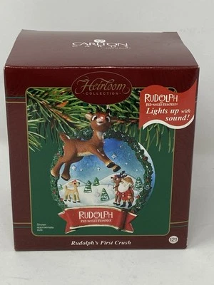 CARLTON CARDS HIERLOOM RUDOLPH'S FIRST CRUSH' CHRISTMAS ORNAMENT LIGHTS & SOUND - Image 1 of 4