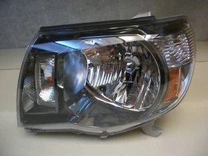 FARO TOYOTA TACOMA LENTE AHUMADA 05 06 07 08 09 10 11 OEM LH - Imagen 1 de 6