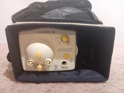 Extractor de leche avanzado con cargador Medela con estilo Foto 1 de 4