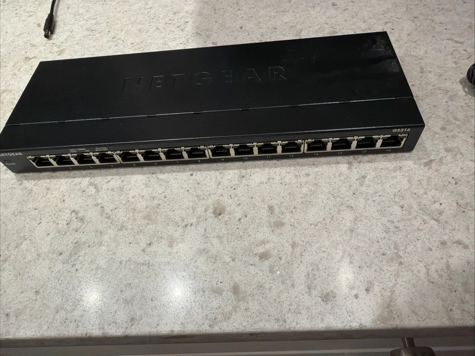 NETGEAR 16-Port 10/100/1000 Mbps Gigabit Unmanaged Switch - W/ Oem Power Supply - Image 1 of 4