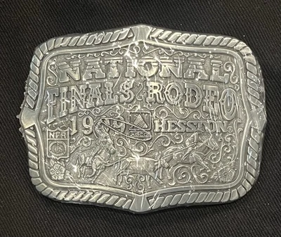 Vintage 1999 Hesston Belt Buckle - National Finals Rodeo NOS (814) - Image 1 of 2