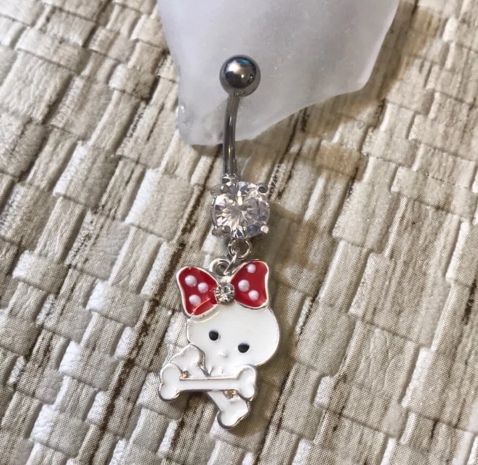 Anillo de ombligo colgante de calavera y huesos cruzados de acero quirúrgico calibre 14 anillo de ombligo Foto 1 de 1