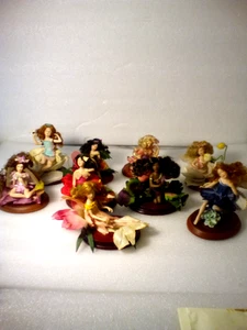 Lotto 9 statuine vintage fiori fata porcellana con basi in legno gallerie paradiso - Foto 1 di 13