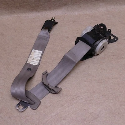1994-1995 Subaru SVX RH Passenger Side Rear Seat Belt Retractor Beige OEM 52763 - Image 1 of 4