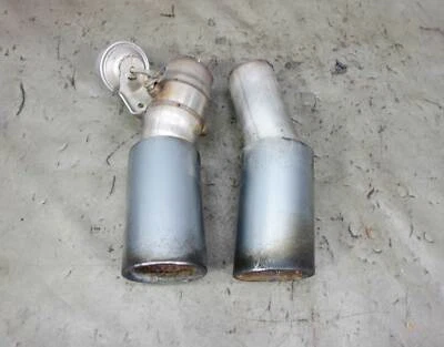 BMW E90 335i N55 2011 sedán puntas silenciadoras traseras de fábrica con solapa de vacío cromada OEM Foto 1 de 4