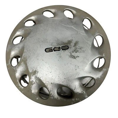 Geo Metro 1993 OEM cubierta de rueda tapacubos 12 orificios 92 93 94 Foto 1 de 4