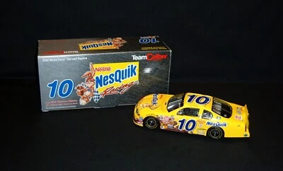 Banco de monedas Team Caliber Jeff Green #10 Nestlé NesQuik 2000 Monte Carlo nuevo en caja Foto 1 de 4