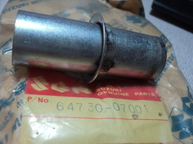 Buje trasero espaciador Suzuki GT185 T125 TC120 TS90 TC90 1967-75 NOS OEM 64730-07001 Foto 1 de 1