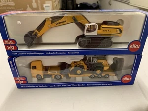 Siku 1:87 1874 Liebherr Bagger und 1839 Tieflader mit Radlader in OVP - Bild 1 von 4