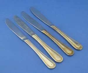 4 cuchillos de cena de toalla con bordes plateados - Imagen 1 de 3